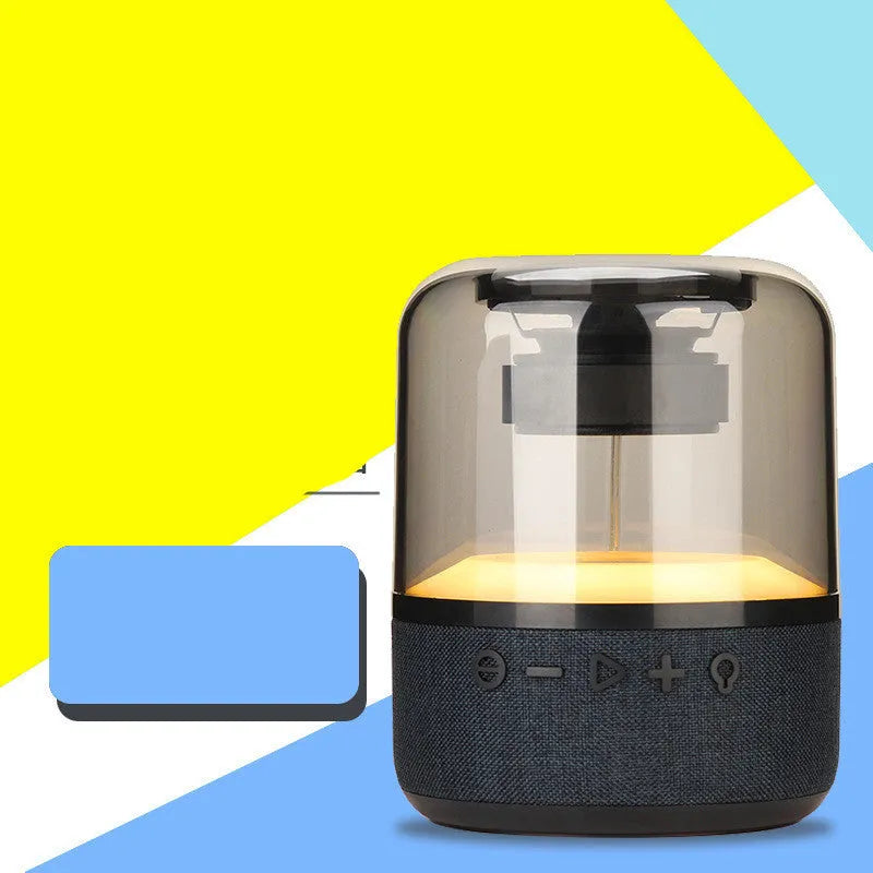 Black wireless Bluetooth speaker with colour-changing halo lights and control buttons