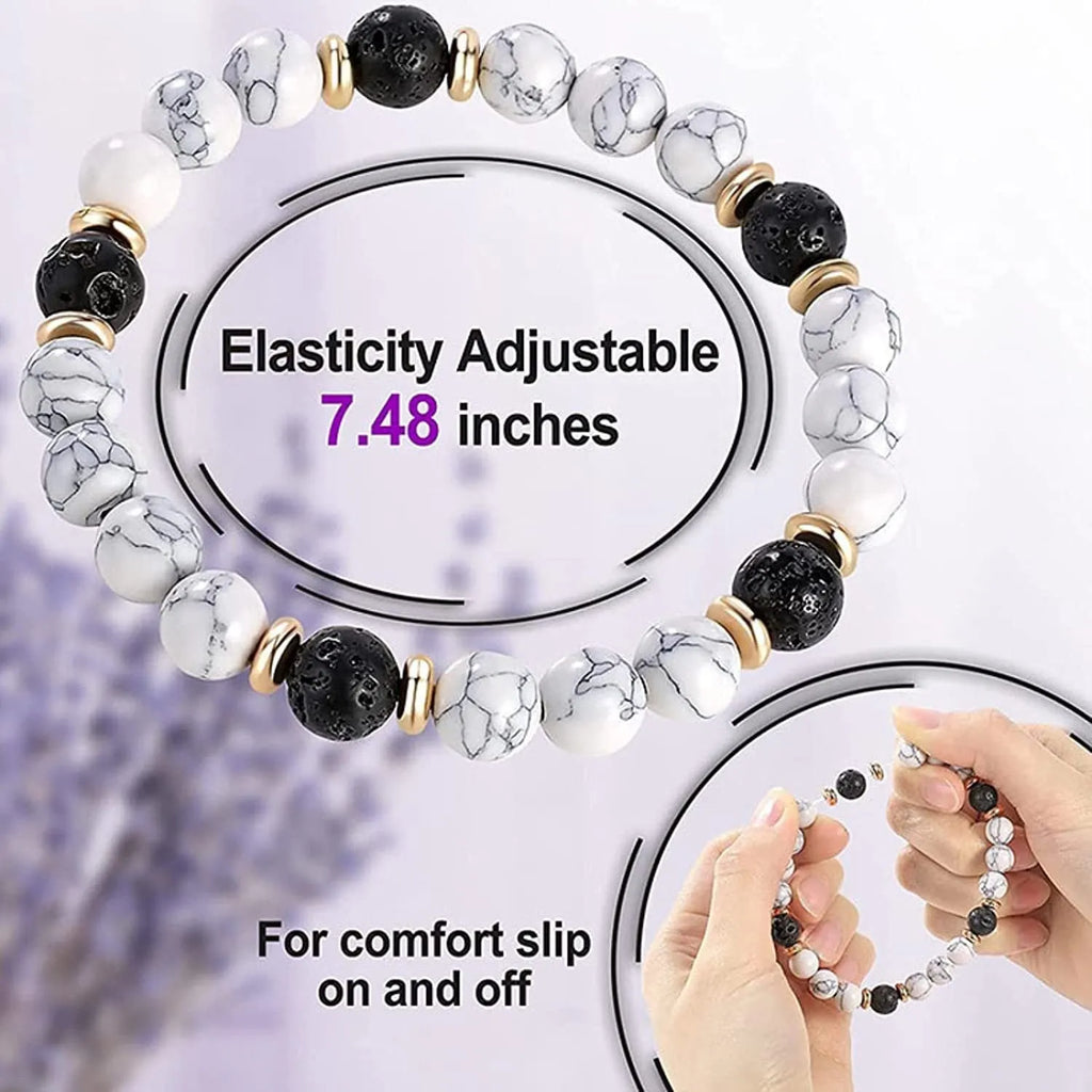 Natural stone bracelet with alloy volcano white turquoise centrepiece and mixed tiger eye beads on white background