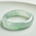 Natural jade bracelet light green colour unisex sizes 53 to 64