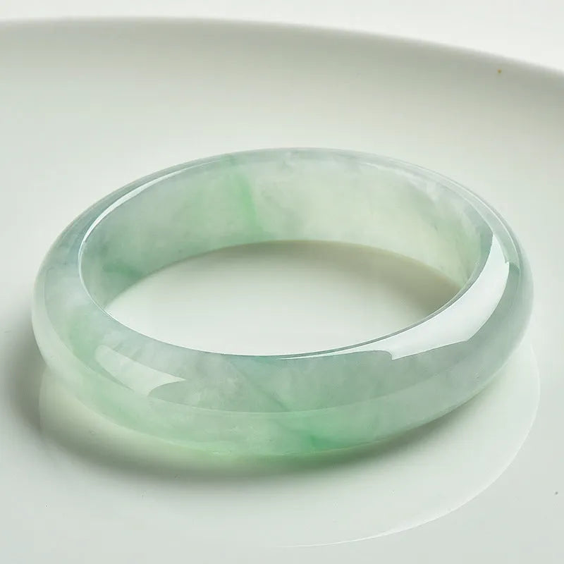 Natural jade bracelet light green colour unisex sizes 53 to 64