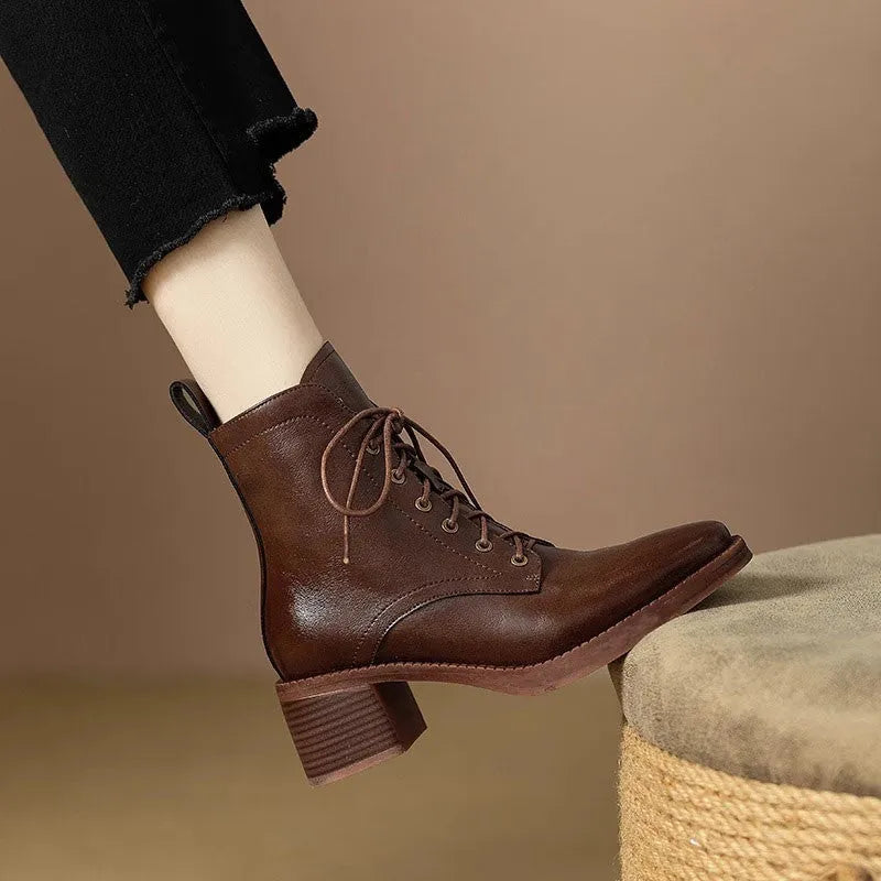 Women's black pointed-toe ankle boots with 5.5cm heel and 13cm shaft height