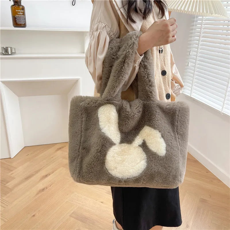 Women's plush shoulder bag with cartoon rabbit ears decoration in solid colour options