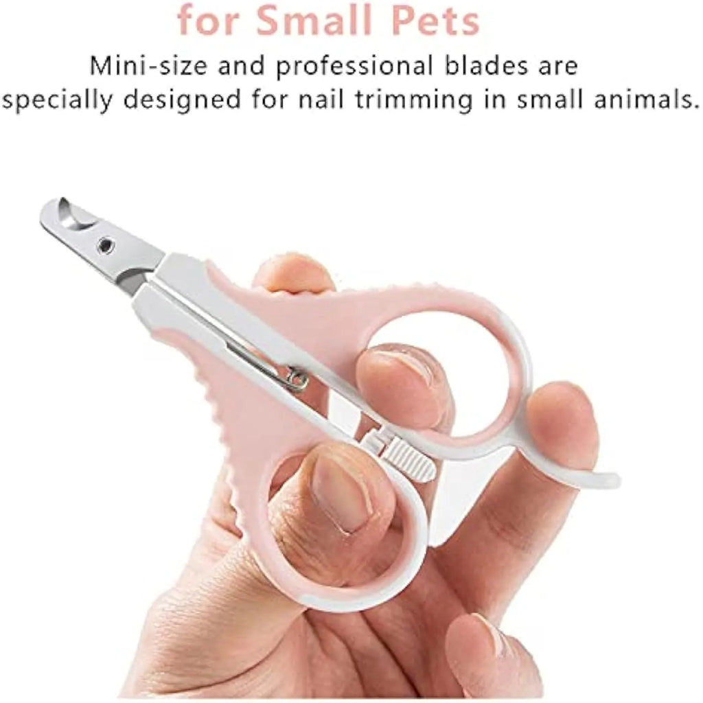 Grey and pink cat nail clippers with angled blade and safety guard on a table.