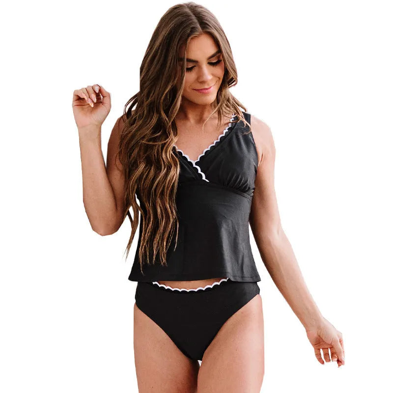 Black solid colour women's nylon bikini swimsuit on a white background