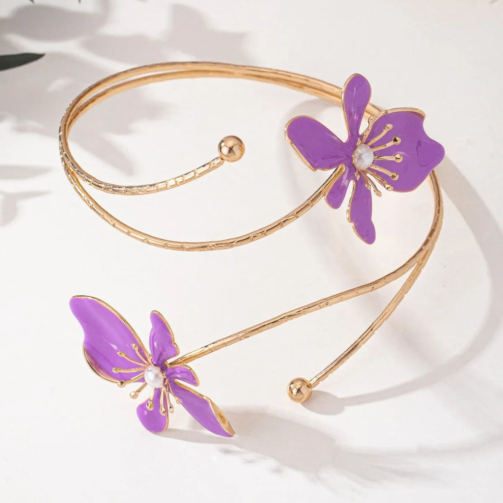 Alloy hollow armband bracelet with decorative pattern in pink or purple colour