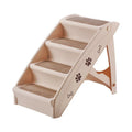 Foldable plastic step ladder for small dogs and cats beside a sofa