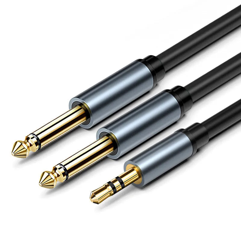 3.5mm to two 6.5mm male audio cable with gold-plated connectors on a black background