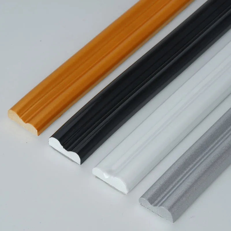 Flexible PVC shaping frame with self-adhesive edge banding in black flat style on a wall surface