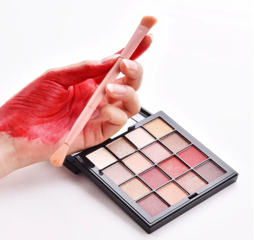 Ten makeup brushes with wooden handles including powder, foundation, and detail brushes for complete face application