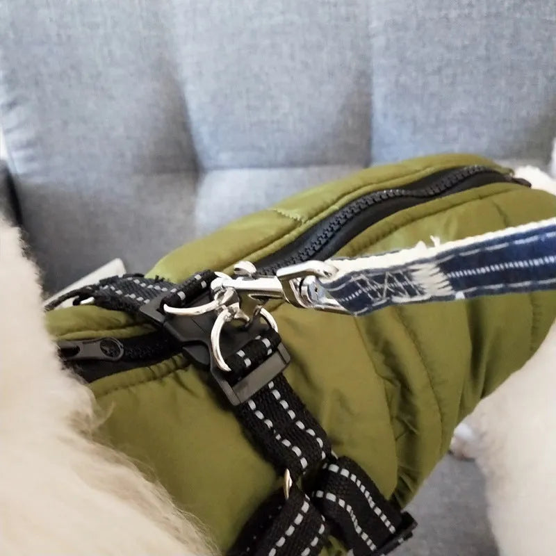 Waterproof dog coat in rain silk fabric with a harness hole, shown in red, navy blue, and army green.