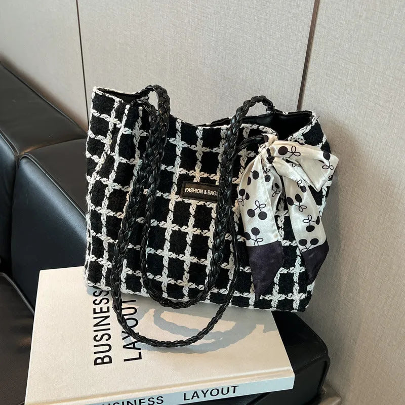 Woolen shoulder bag in black with horizontal square shape and sandwich pocket for commuting and shopping use