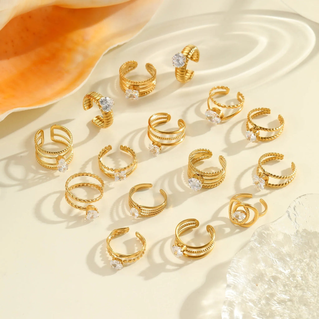Geometric stainless steel ring with gold inlaid zircon heart shape design