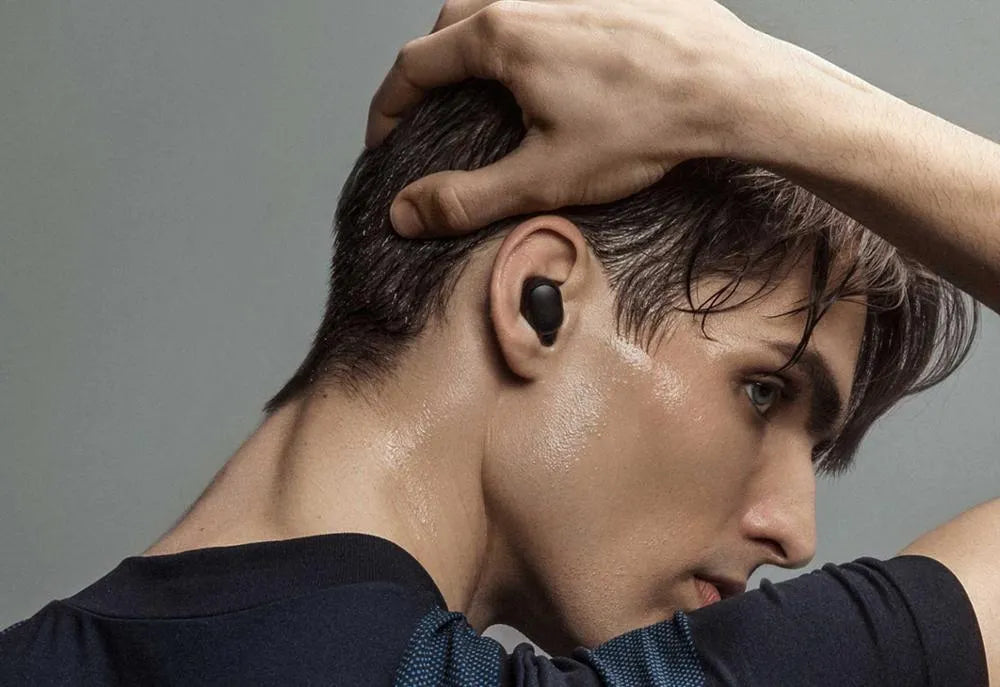 Black Redmi AirDots 2 true wireless Bluetooth earphones with charging case.