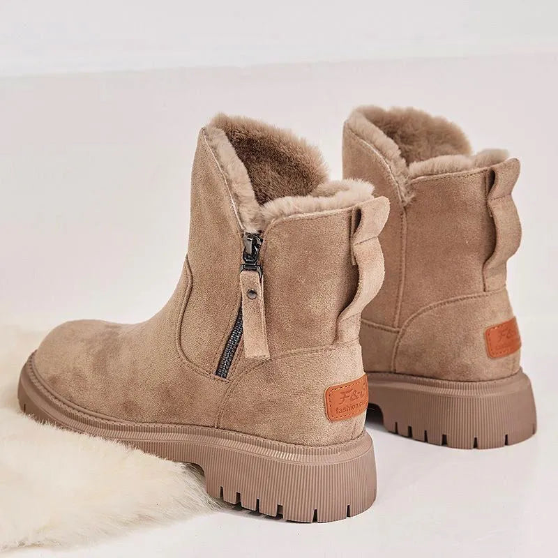 Women's black thick plush snow boots with faux suede upper, side zip, and non-slip rubber sole.