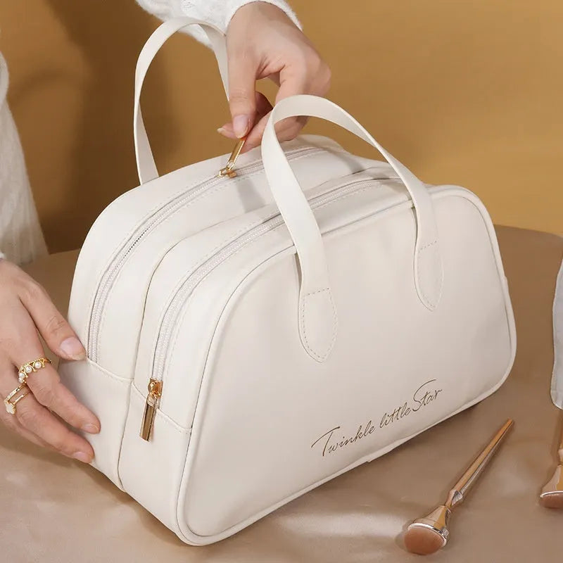PU leather travel toiletry bag showing dry-wet separation and expansion features