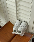 Fashion girls lightweight casual shoes in PU leather mesh, shown in solid black, beige, and pink colours.