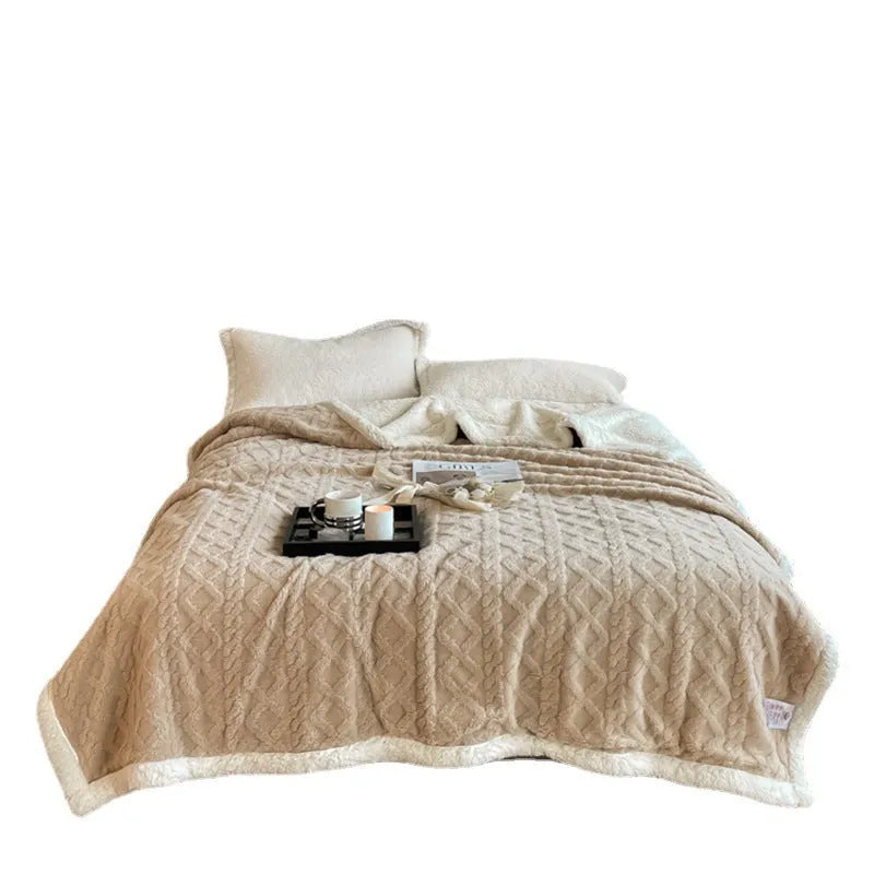 180x200cm thermal polyester blanket in tea green colour on a bed