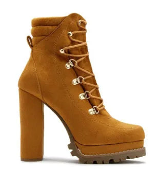 Women's army green suede ankle boots with a thick high heel and round toe.