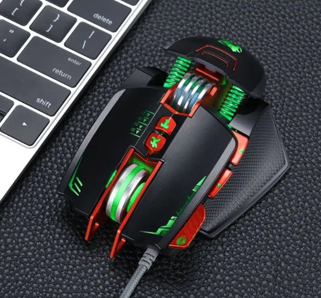 Thunder Wolf V9 wired gaming mouse in black or grey on a mousepad, showing its six buttons and ergonomic shape.