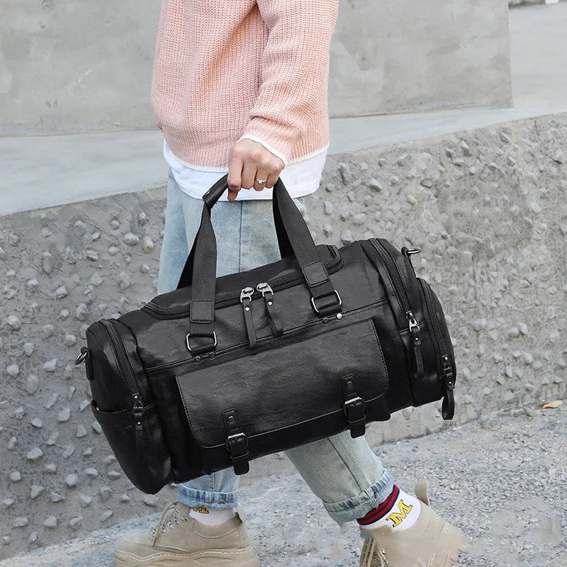 Large black travel shoe bag with separate storage compartment measuring 52cm x 19cm x 27cm