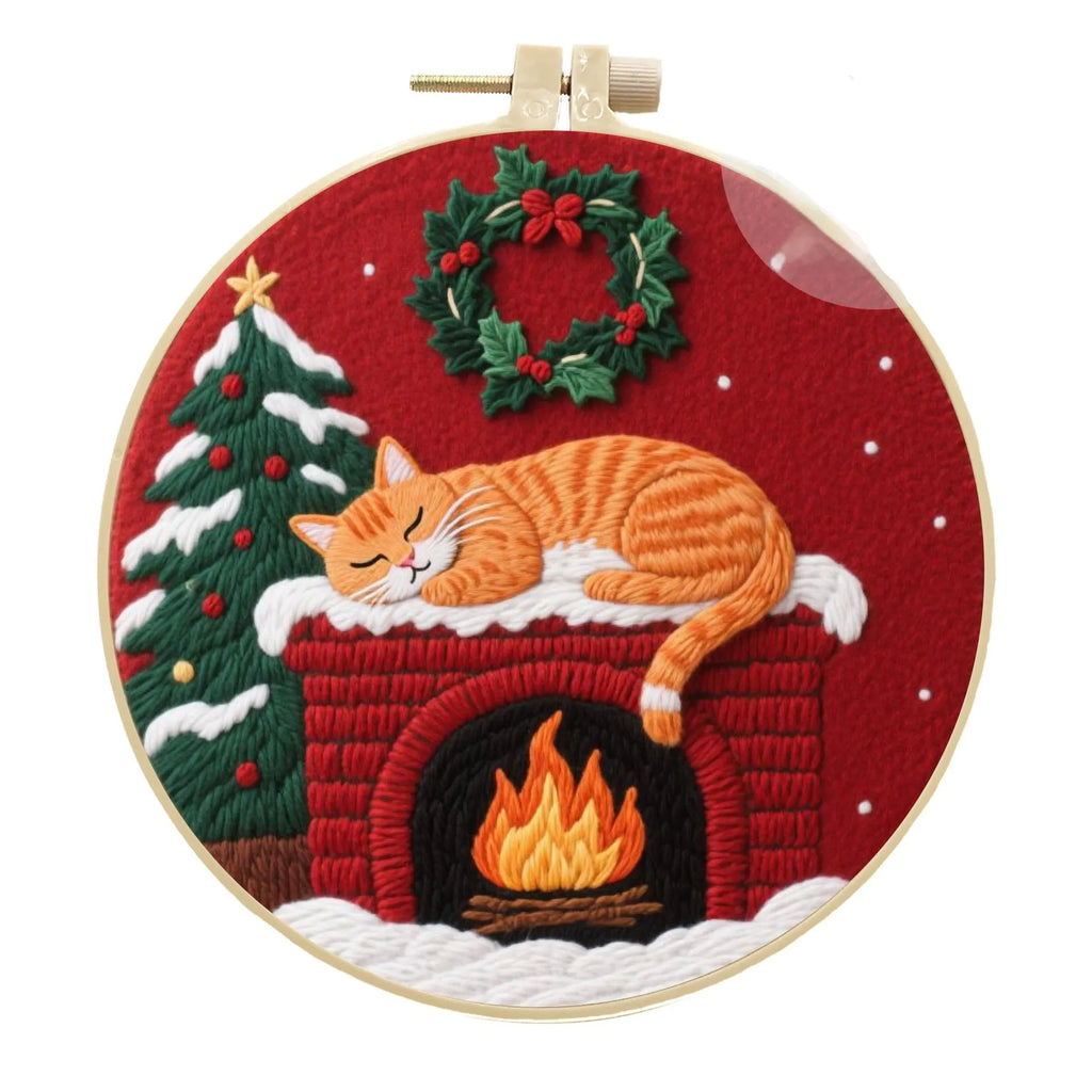 Cat embroidery DIY material kit with cotton linen fabric, 20cm bamboo hoop, and scissors on a table.
