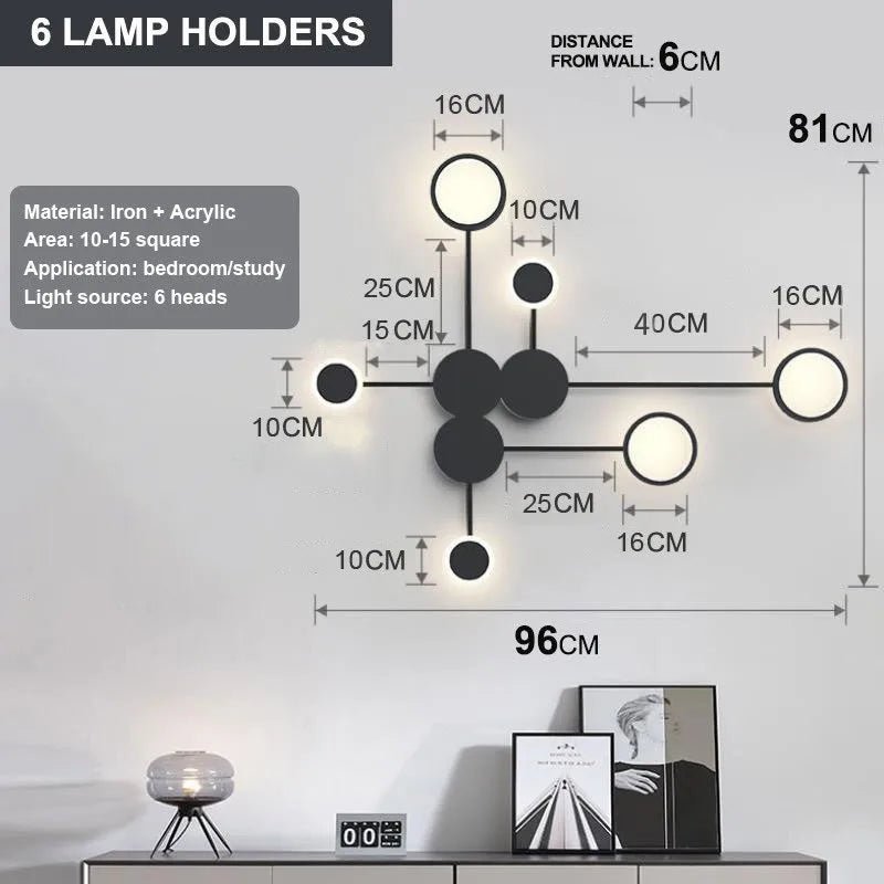 Contracted wall lamp with six heads, iron and acrylic construction, available in black finish mounted on a wall