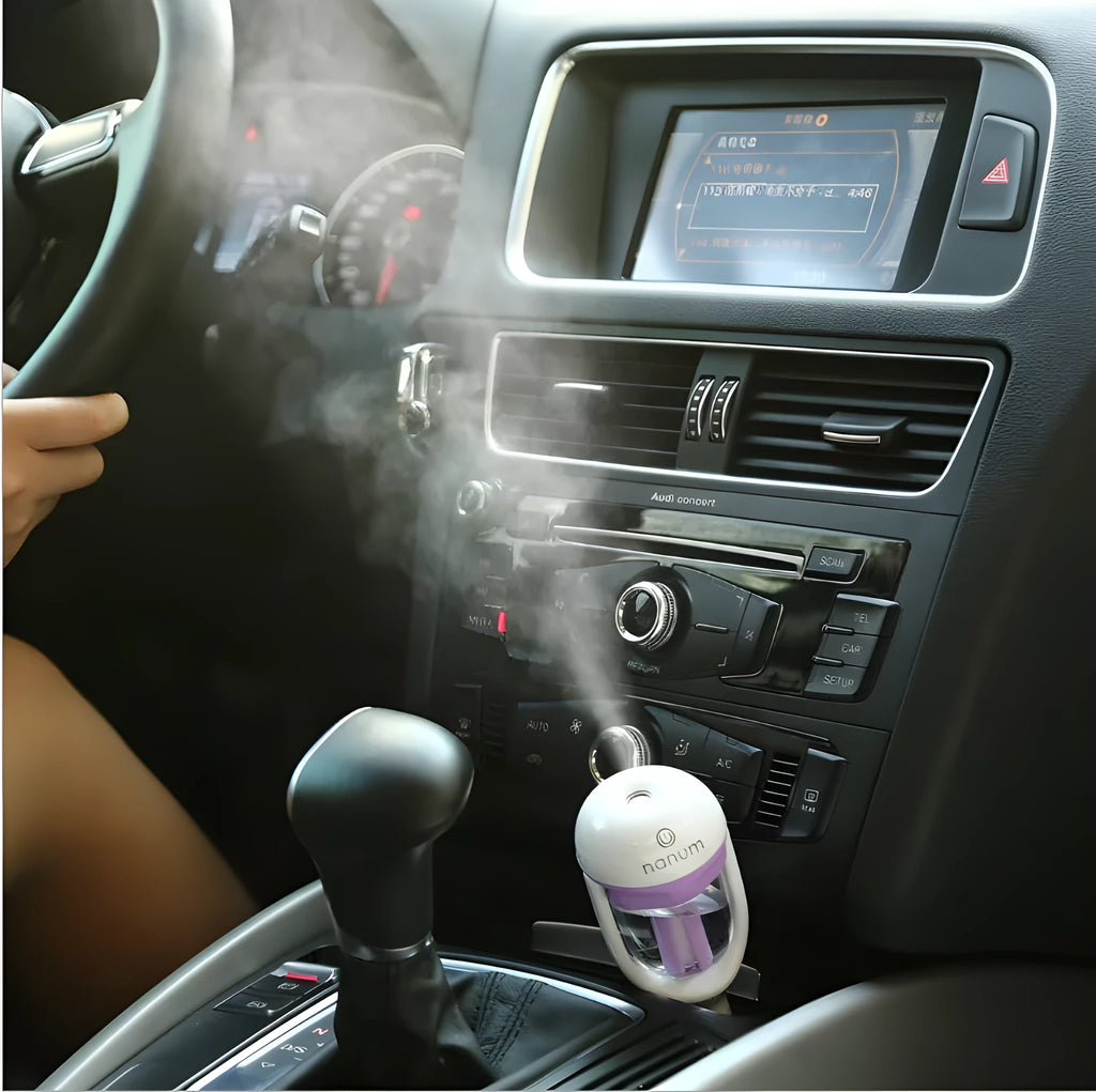 Portable car humidifier air purifier freshener with essential oil diffuser in compact travel design