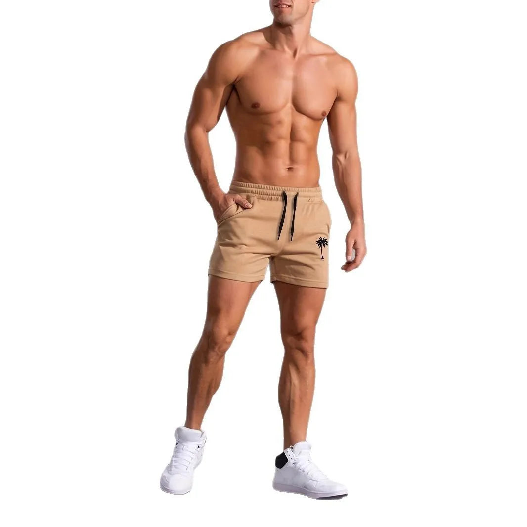 Men's casual khaki polyester sports shorts with coconut print on a model