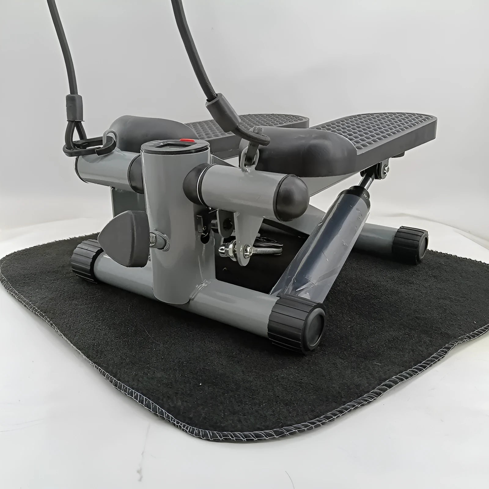 Silver grey hydraulic resistance mini treadmill with pedal components for home waist slimming exercise