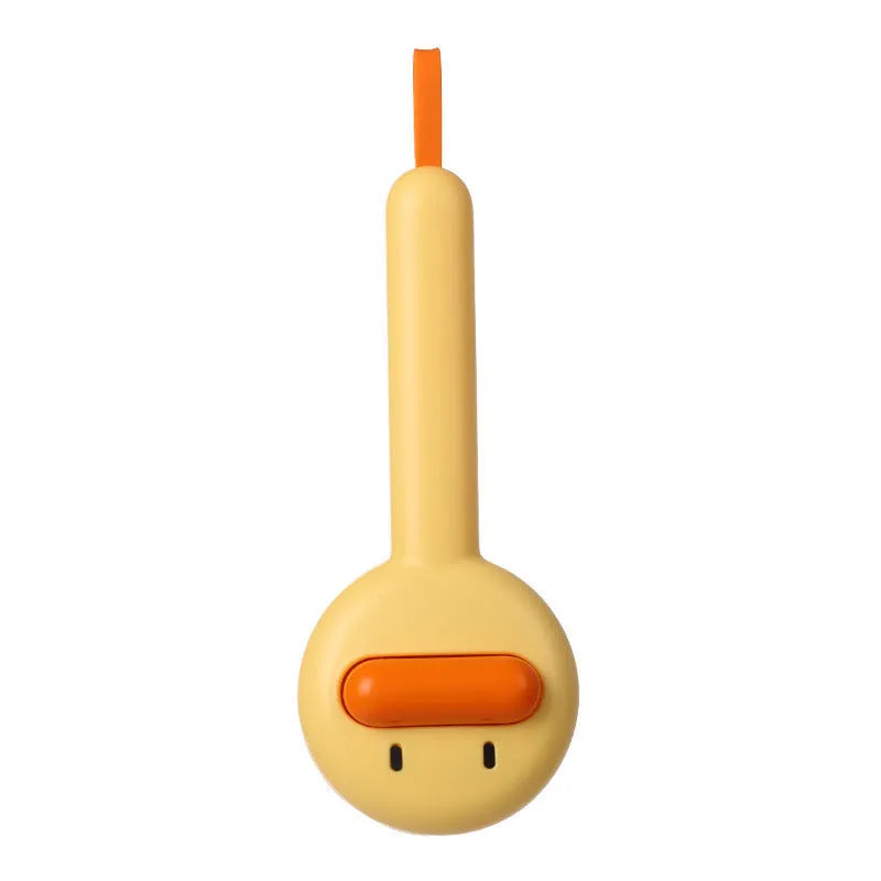 Small yellow duck-shaped pet grooming comb with needle head for hair removal on cats and dogs.