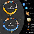 Set of twelve natural stone beaded bracelets with zodiac signs on adjustable elastic cords