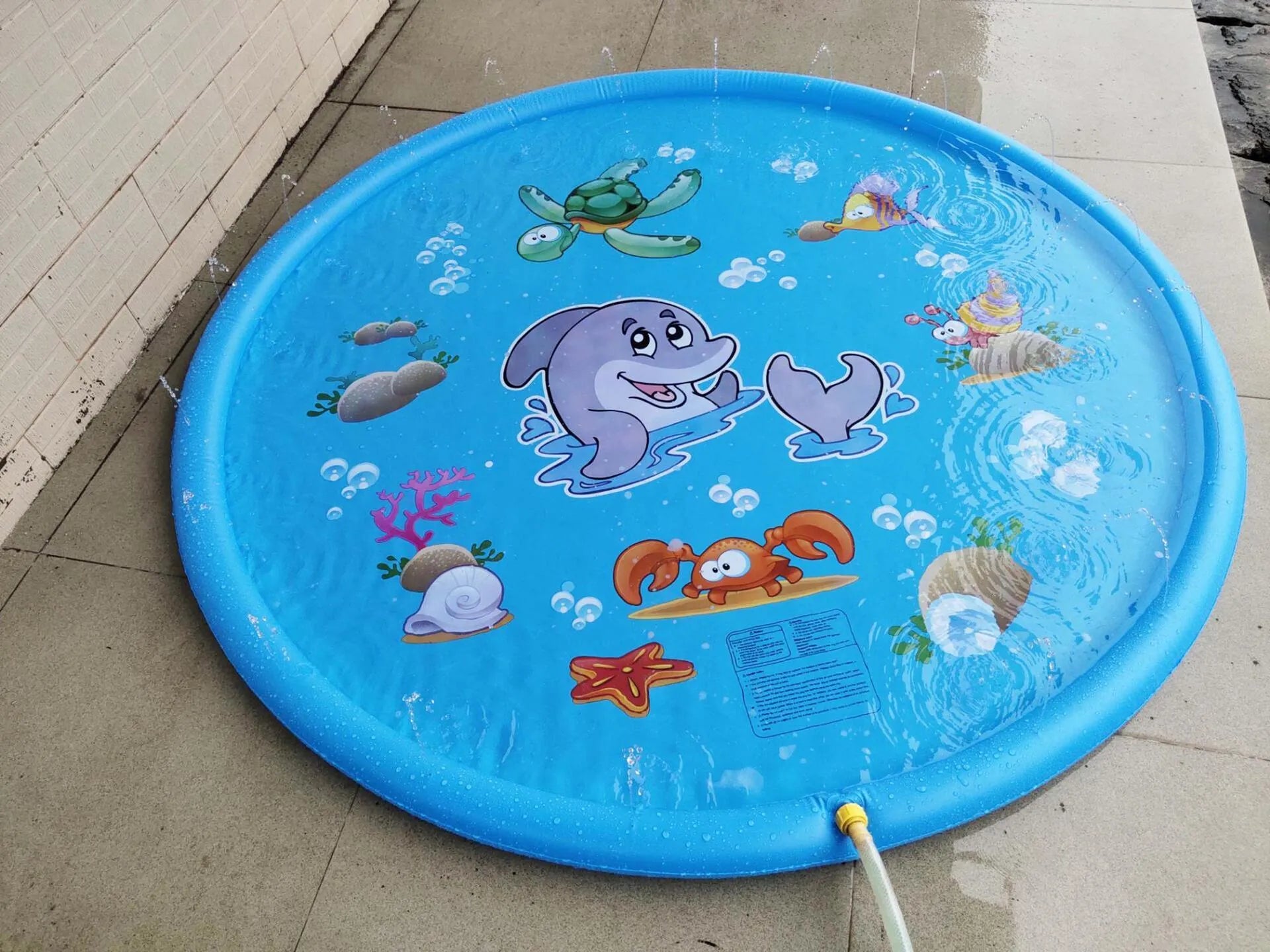 Blue PVC children's water spray play mat with marine animal designs, shown in 100cm and 170cm sizes.
