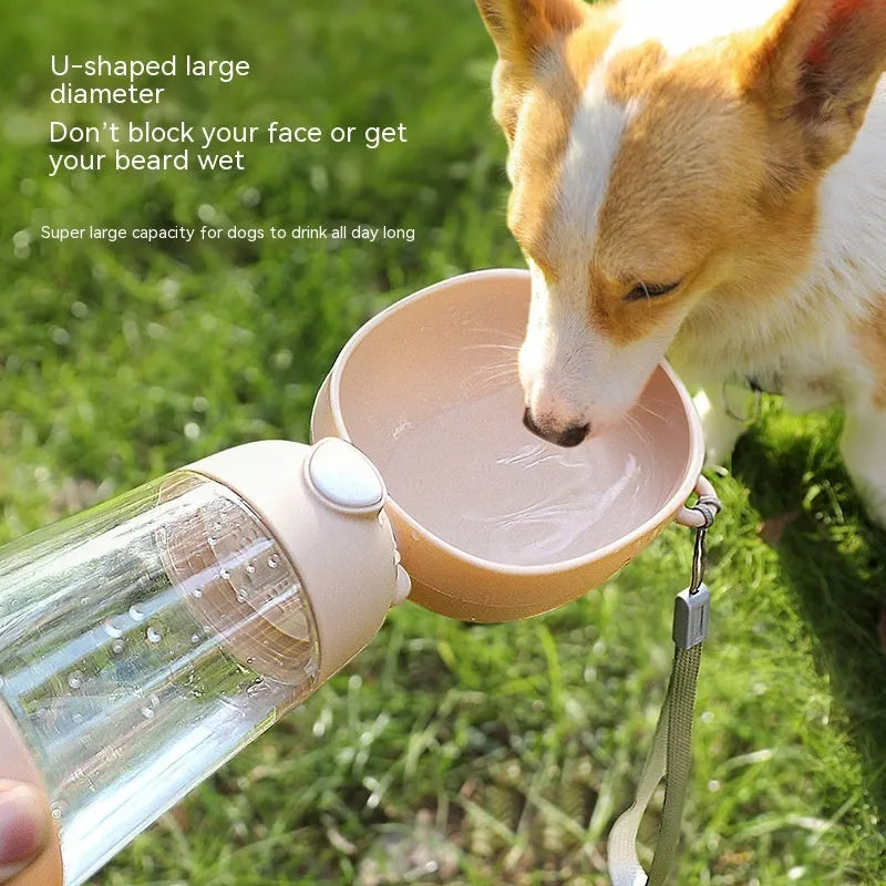 Portable collapsible dog water bottle with food container in brown pink yellow colours for outdoor pet travel