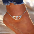 Silver geometric alloy anklet on ankle, 18cm length, simple electroplated finish