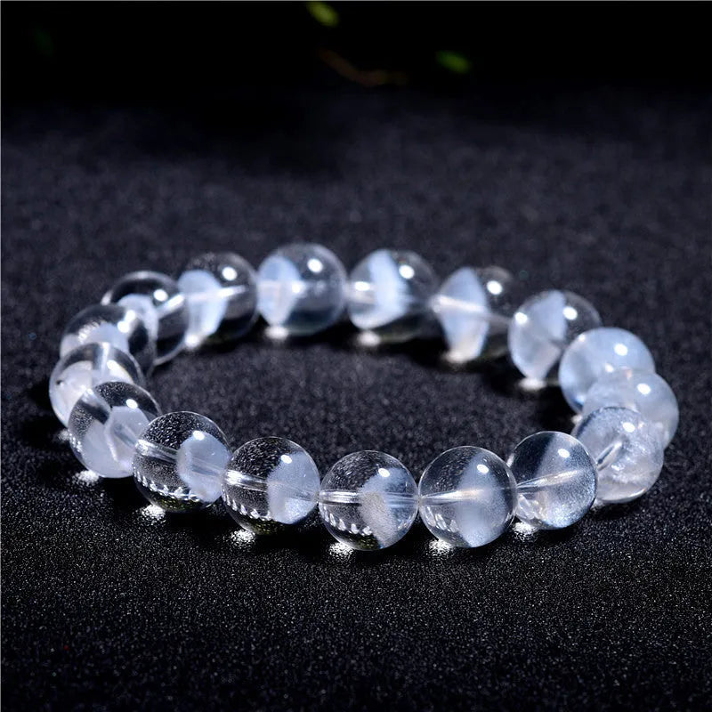 Natural white crystal ghost pyramid bracelet with Ruyi elements showing pyramid shapes and original design