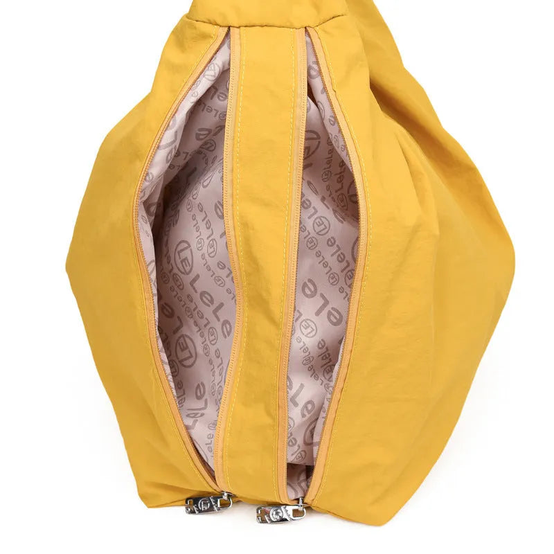 Women's heart-shaped nylon crossbody bag in black, blue, khaki or yellow with large capacity