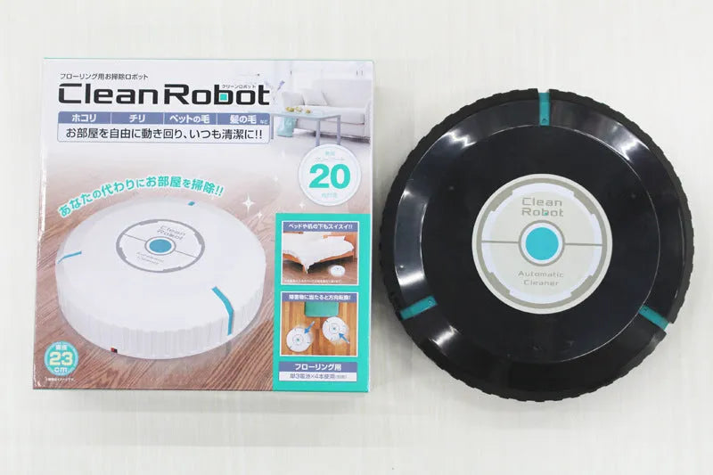 AC Sweeping Robot automatic vacuum cleaner in black or white on a wooden floor.