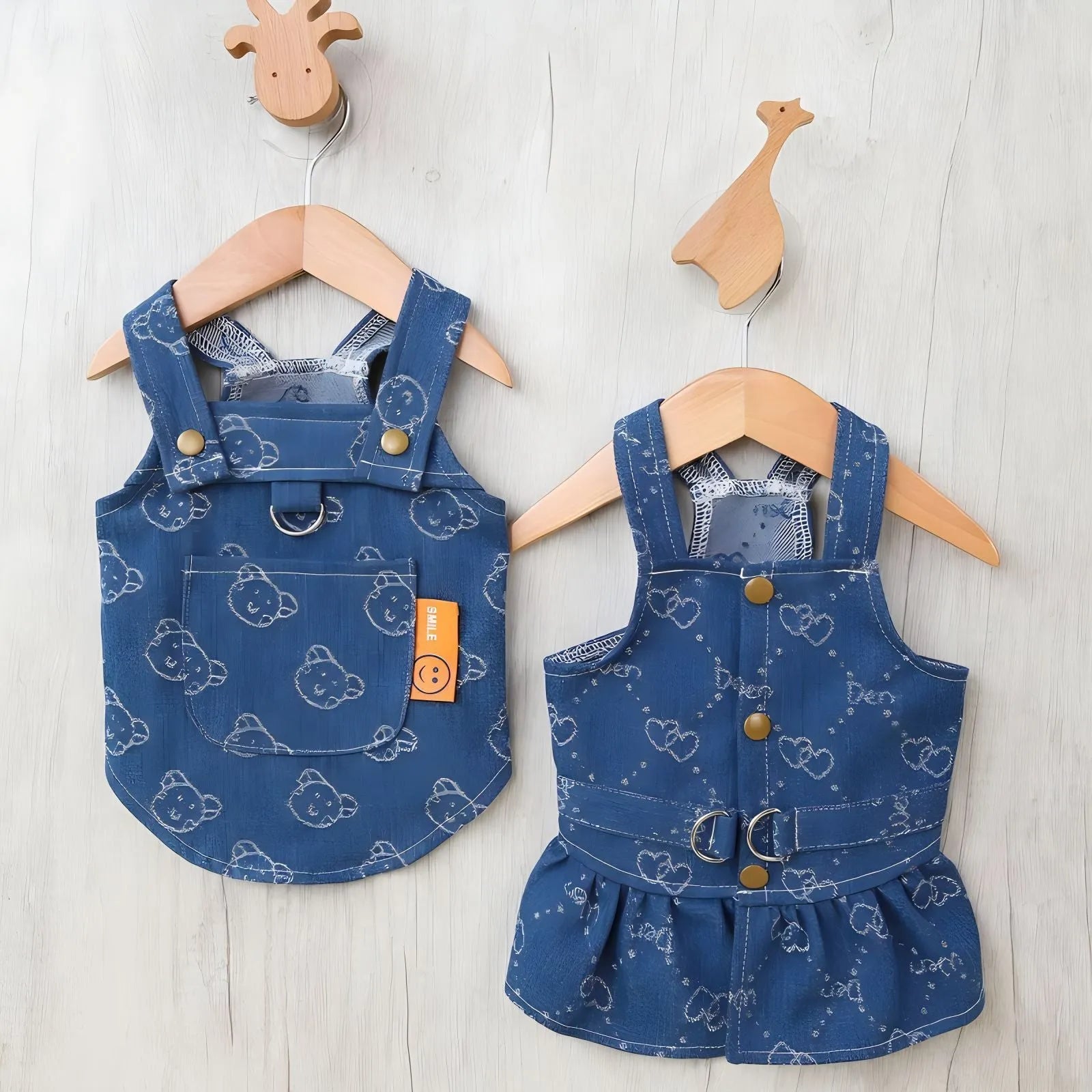 Teddy Bichon dog wearing denim princess dress with bracket skirt detailing