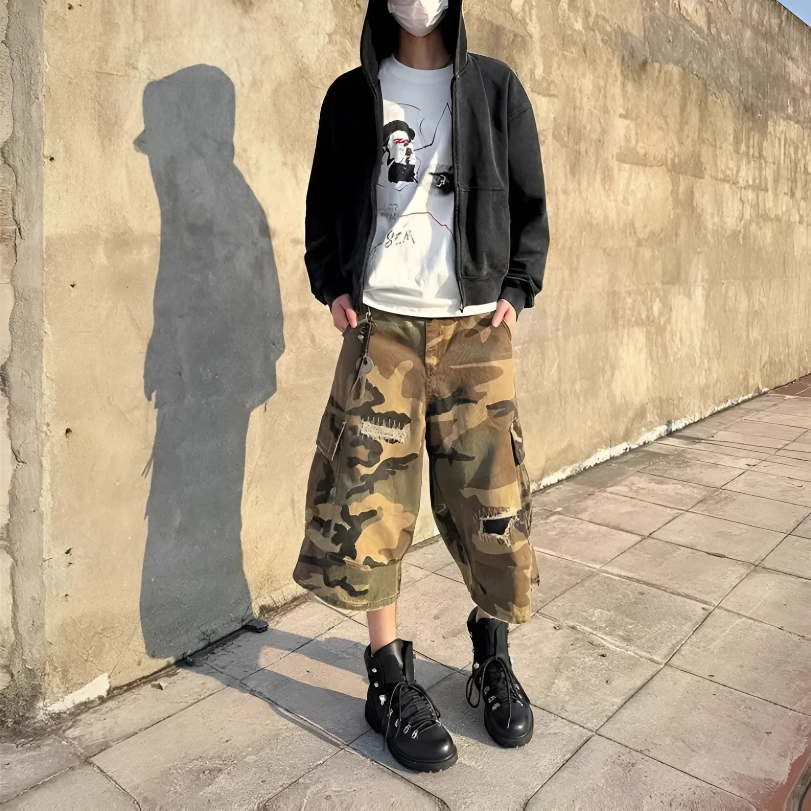 Men's camouflage coloured cropped jeans with ripped detailing and straight leg loose fit