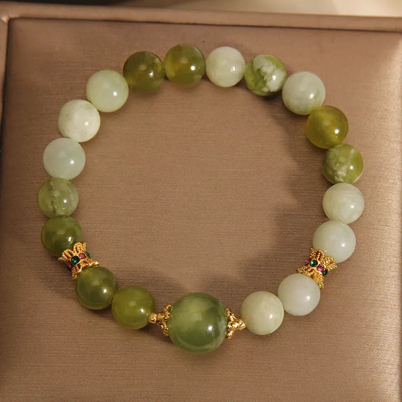 Women's jade green bracelet made from Xiuyan jade stone with adjustable cord