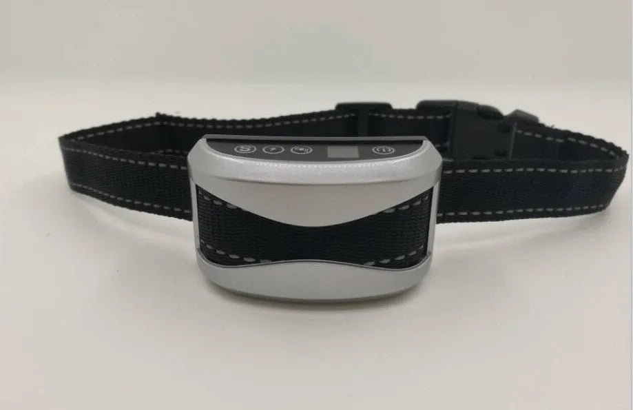 Digital anti-bark training collar with control unit displaying screen, adjustable nylon strap, and micro-USB charger