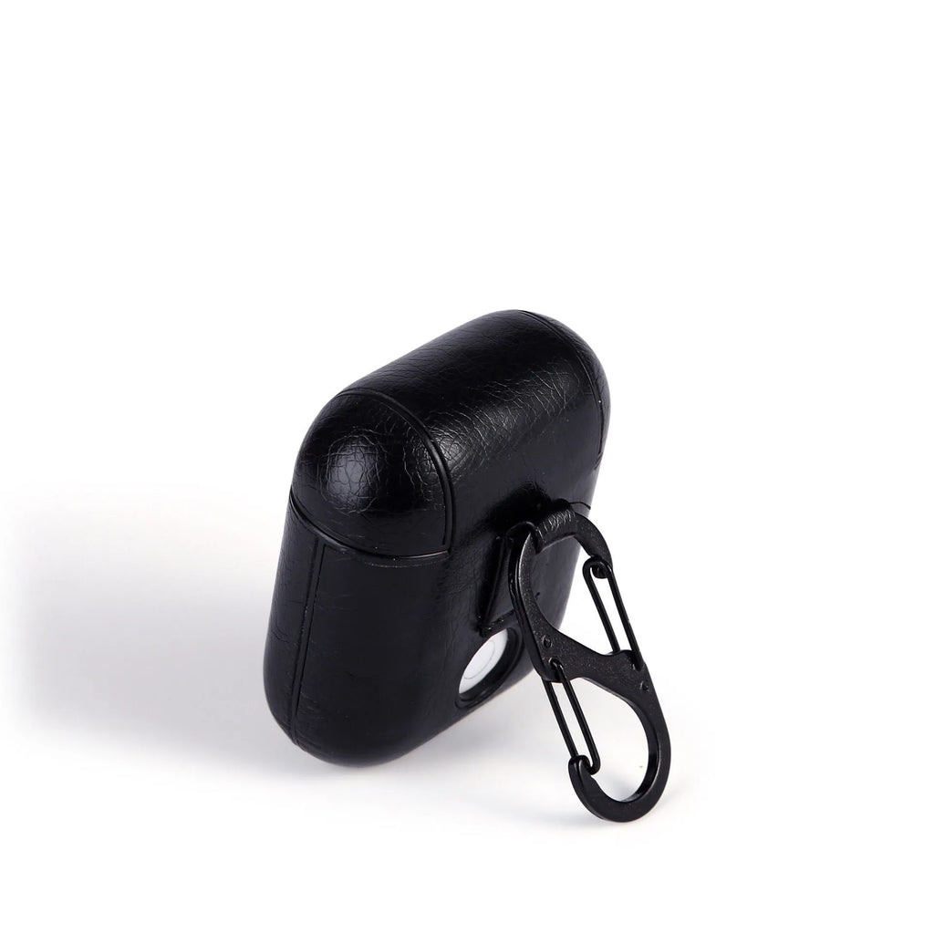 Genuine leather protective pouch for Apple AirPods charging case in black, brown, light brown, and red.