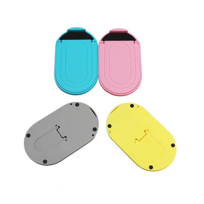 Plastic mobile phone stand bracket in six colour options showing adjustable angle design