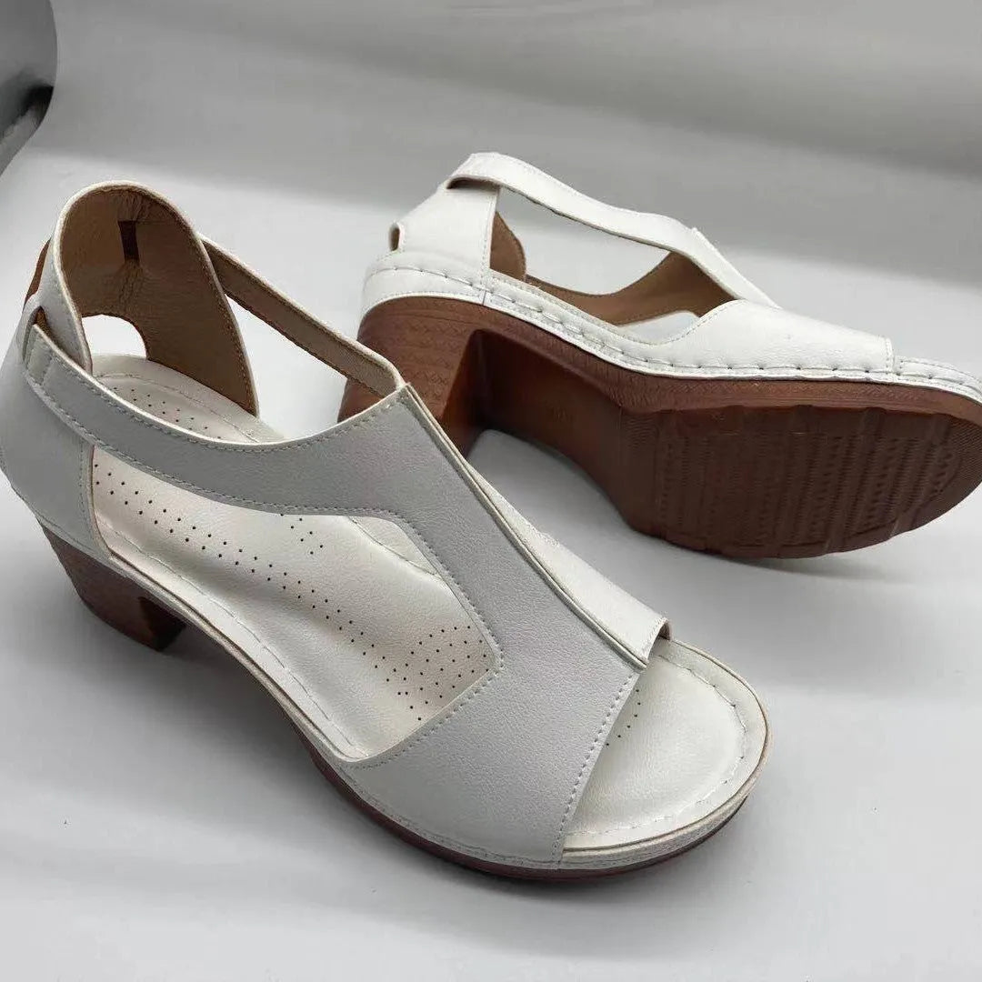 Womens plus size peep toe wedge sandals with buckle and low heel in various colours.