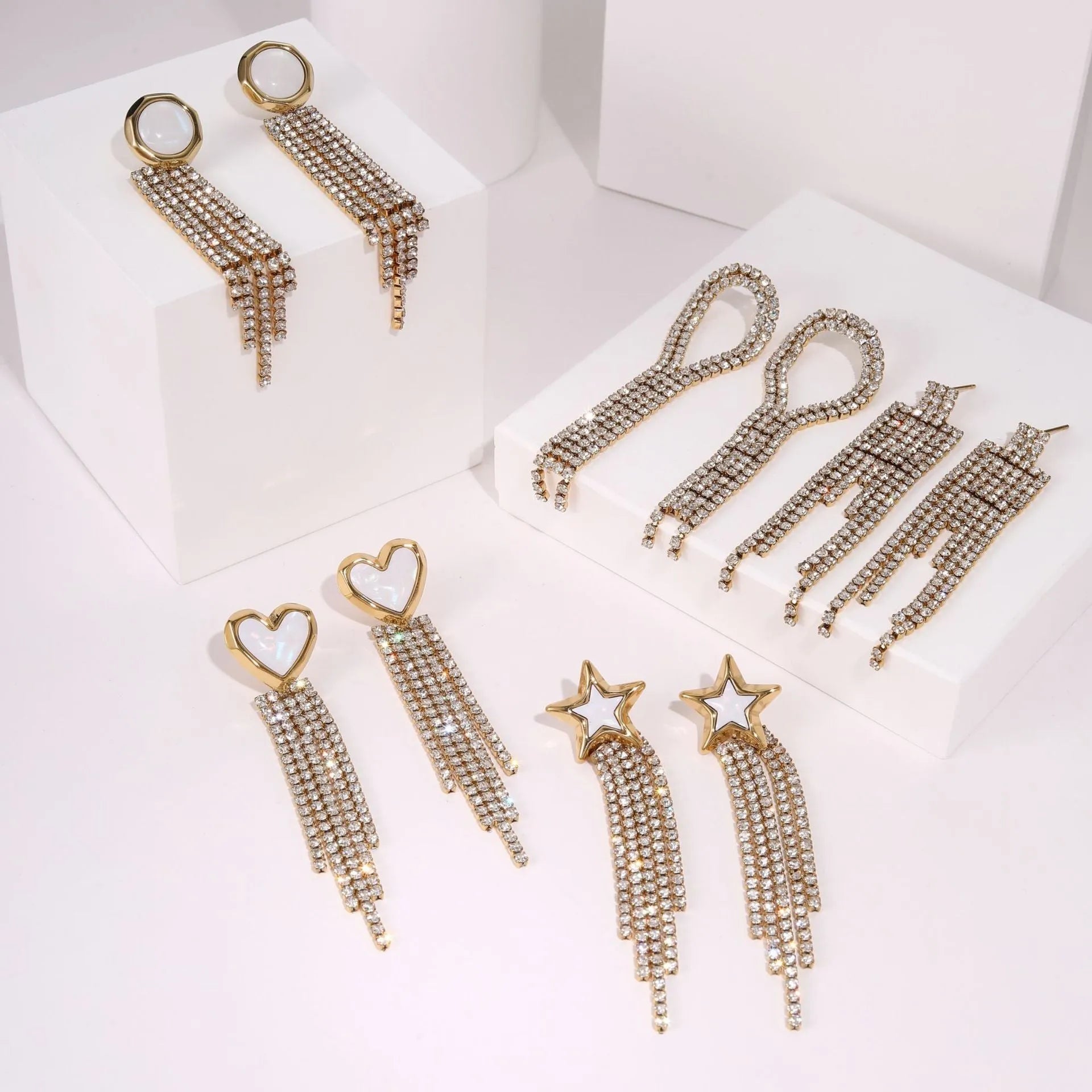 Women's stainless steel diamond tassel love earrings with heart shape and star geometric design elements