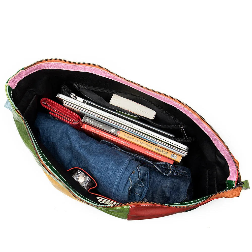 Cowhide leather crossbody travel bag showing stitching detail and 48cm dimensions