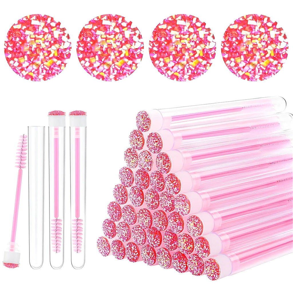 Disposable spiral mascara brushes in blue, green, pink, and purple with transparent storage tubes on white background