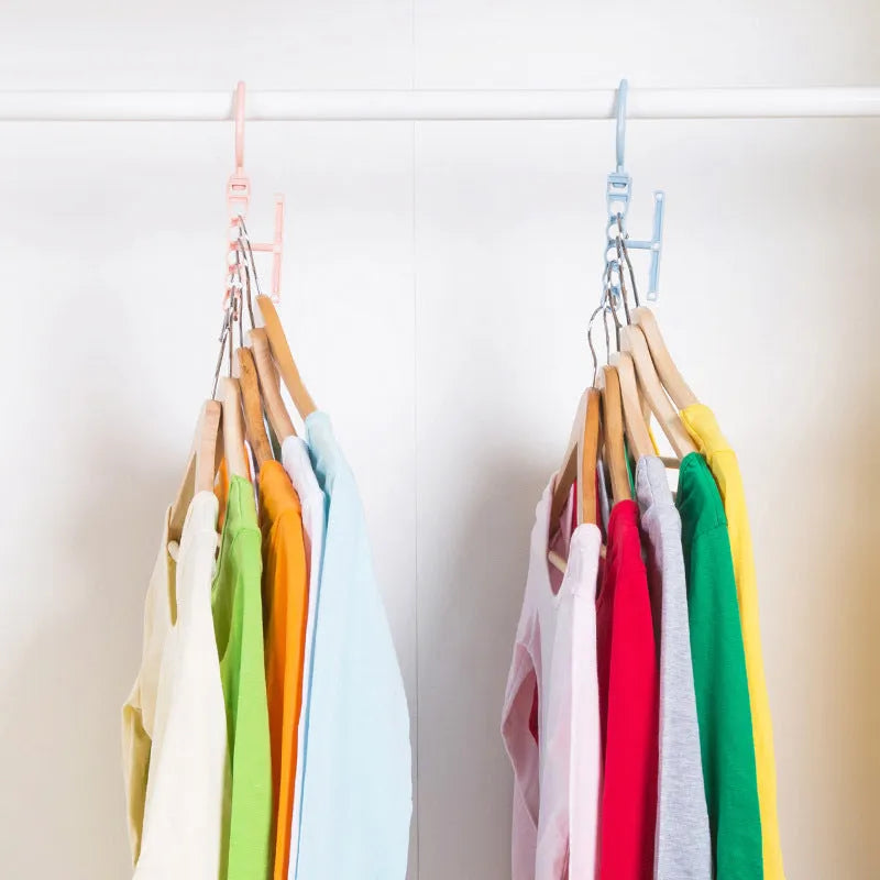 Magic wardrobe hanger with five holes and handle in blue, green, or pink colour options