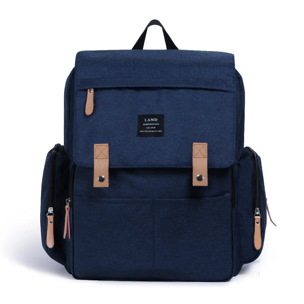 LAND Mommy Diaper Backpack in oxford cloth with changing mat, shown in grey colour.