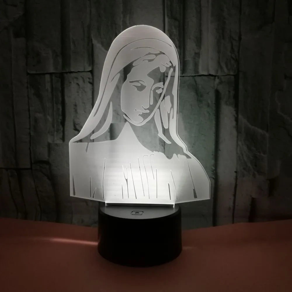 3D LED kids night light with colourful ring pattern, USB cable, and touch-sensitive base on a table.